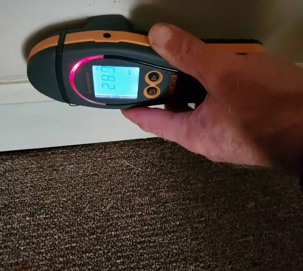 Moisture detection at baseboard during Storm Damage Restoration in West Haverstraw